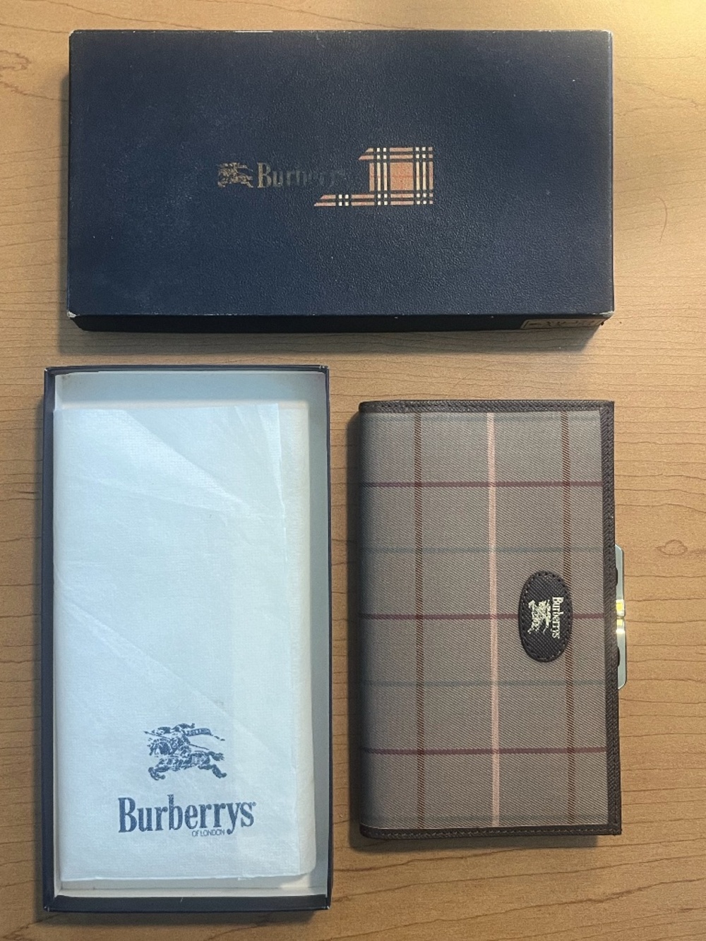 Vintage Burberry's leather bifold wallet with haymarket canvas check horse logo